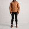 Hero shot of premium jacket showcasing leather texture in natural light