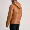 Hero shot of premium jacket showcasing leather texture in natural light