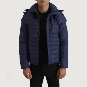 Hero shot jacket in blizzard conditions showing hood deployment